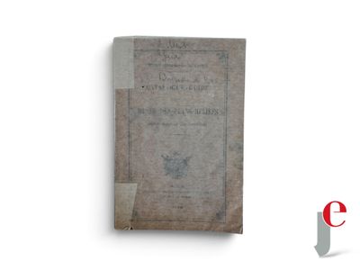 an old book that is sitting on a table