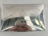 a silver business card case with writing on it