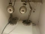 two lamps that are sitting inside of a white box