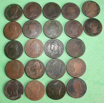 a lot of coins that are on a green surface