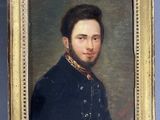 portrait of a man in a blue coat with a gold chain around his neck