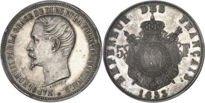 a close up of a coin with a woman ' s face on it