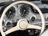 the steering wheel and dashboard of a classic car with a speedometer