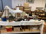 a table with many items on it in a room