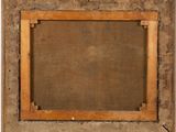 an old picture frame with a brown background and a wooden frame
