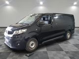 a picture of a black van on a checkered floor