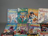 a lot of comic books sitting on a table