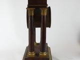 a clock that is sitting on top of a table