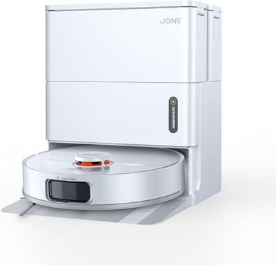 une image d'un aspirateur robotisé sur une surface blanche