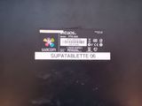 a close up of a laptop with a label on it