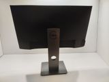 a dell monitor on display in a white box