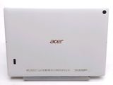 a close up of a laptop on a white surface