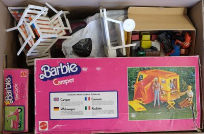 a cardboard box with some toys inside of it