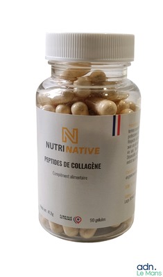 un pot de gélules nutritives posé sur une table