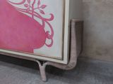 a picture of a painting on the wall of a room