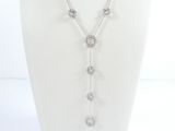a close up of a necklace on a mannequin mannequin