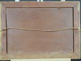 a picture of an old wooden box with a rope around it