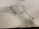 a white cord that is connected to a computer mouse