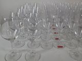 a lot of empty wine glasses on the table