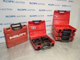 two red tool boxes sitting next to each other on top of a table