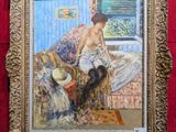 un tableau représentant une femme assise sur un canapé