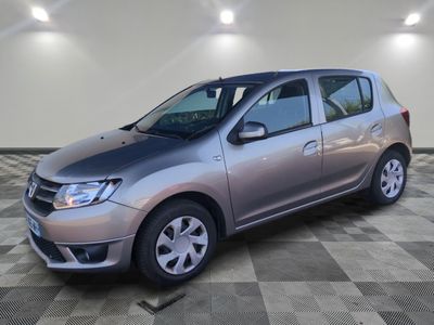 a picture of a silver car parked in a garage