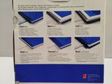 the box is open to show the contents of a combbind