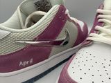 purple and white nike air force 1 low sneakers on a white surface