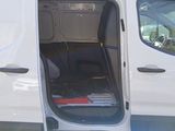 a white van with the door open and the seat down
