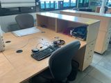 a desk with a keyboard and a monitor on it