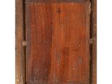a close up of a wooden frame with a wooden door