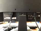 an image of a computer monitor and keyboard on a desk