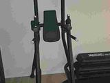 a black and blue exercise equipment in a room