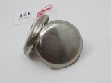 an image of a silver pocket watch on a white surface