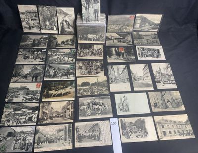 several old black and white photos of people and buildings on a table