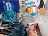 a lot of kitchen utensils that are on the table