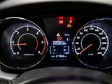 a close up of a car dashboard with a speedometer and gauges