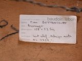 a label on a piece of wood with a barbed wire around it