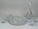 a lot of glass items that are on a table