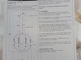a white sheet with instructions on how to install a light fixture