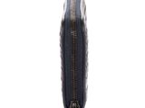 the back view of a black bag with a zipper on it