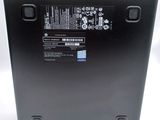 the back of a laptop with a battery attached to it
