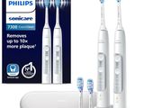 three electric toothbrushes that are in the package