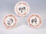three brown and white plates with pictures of people on them