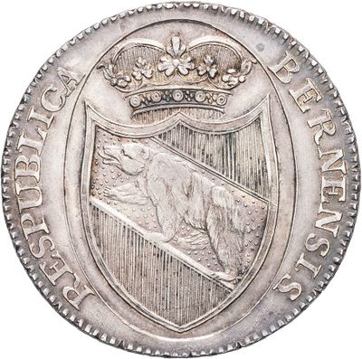 an image of a silver coin with a crown on top of it