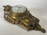 a clock that is sitting on top of a table