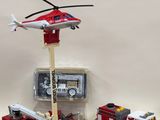 a lot of toys that include a helicopter, firetruck, firetruck, firetruck, firetruck, firetruck, and