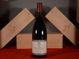 a bottle of wine that is sitting on a table