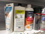 many different types of cleaning products on the shelf