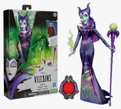 a toy figurine of a female villain in a purple dress